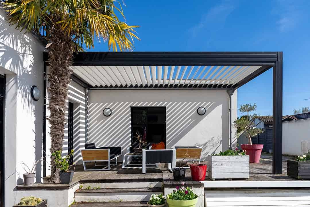 an-outdoor-patio-with-a-pergola - Shade.Shop An outdoor patio with a pergola