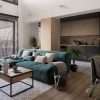 A living room with modern, dark grey window shades