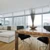 A luxurious living room space with attractive, modern window shades
