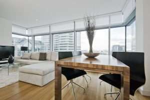 A luxurious living room space with attractive, modern window shades