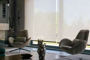 Interior design with modern chairs and motorized roller blinds
